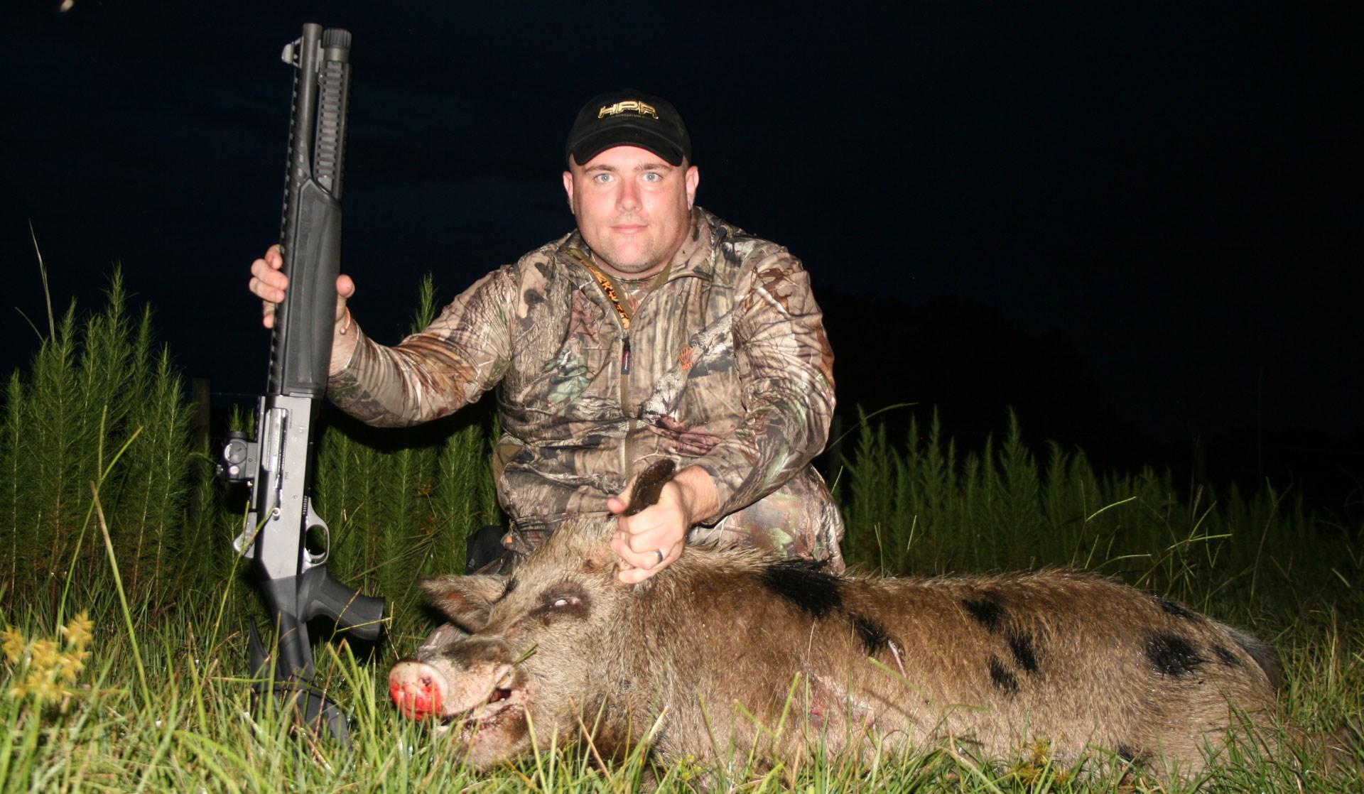 Hunter with hog