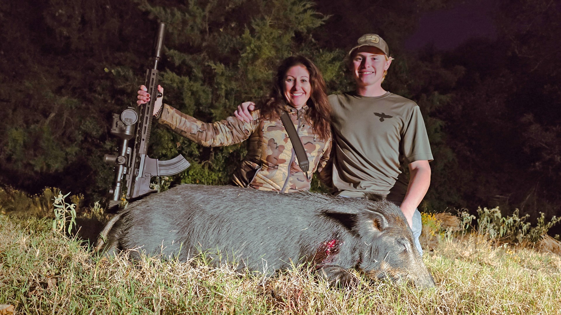 Andi and son with pig