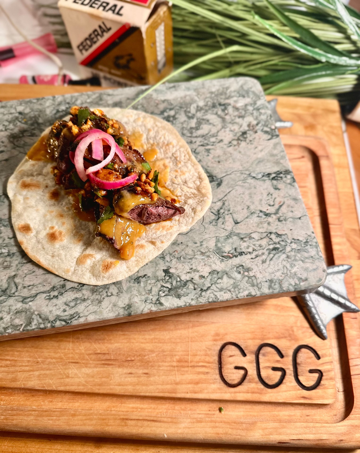Sticky Mango Duck Tacos on cutting board