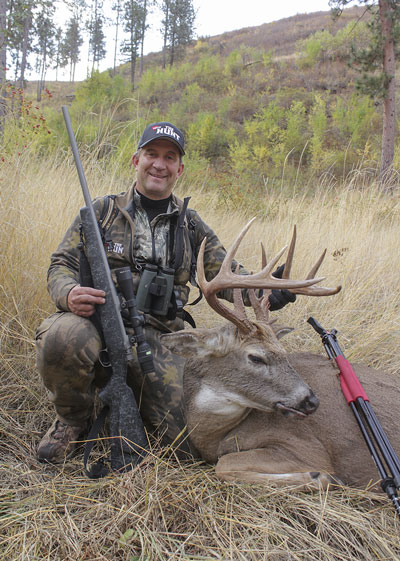 Hunter with deer