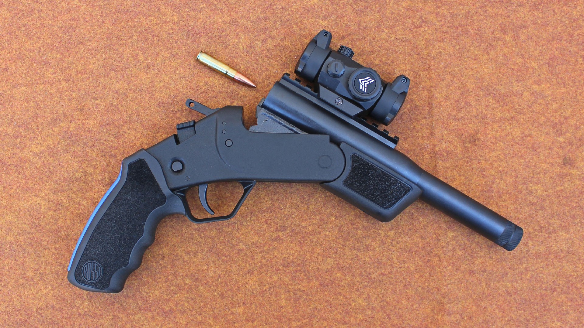 Rossi Brawler Open with cartridge behind it