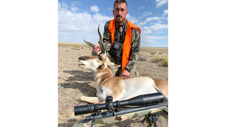 Hunter with pronghorn buck in Colorado