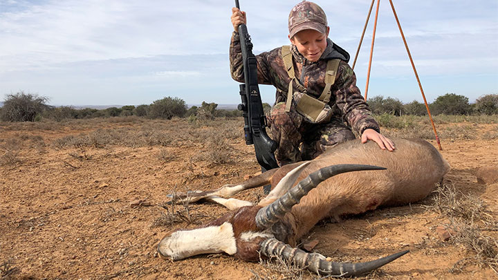 Young hunter with blesbok