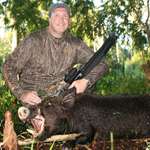 Hunter With Hog