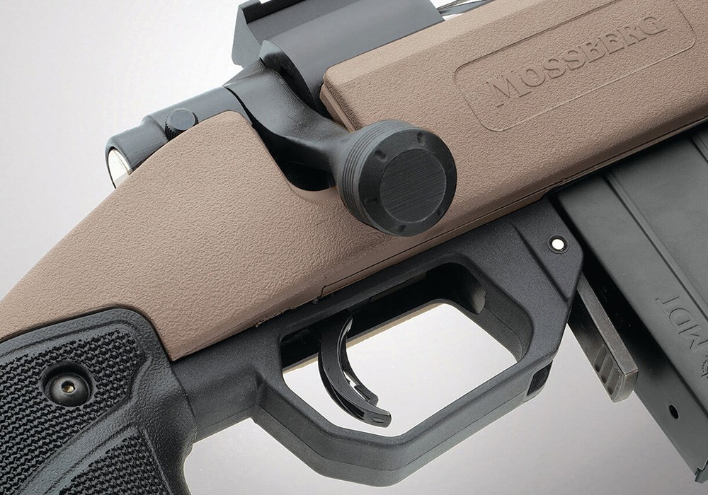 Mossberg Patriot LR Tactical rifle trigger guard and bolt.