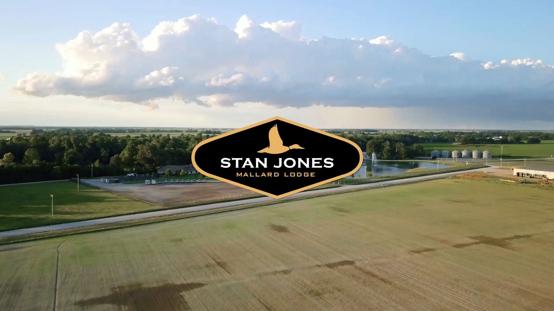 Stan Jones Logo and aerial of grounds