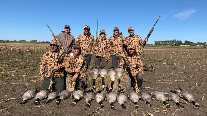 Successful Hunters with their Geese