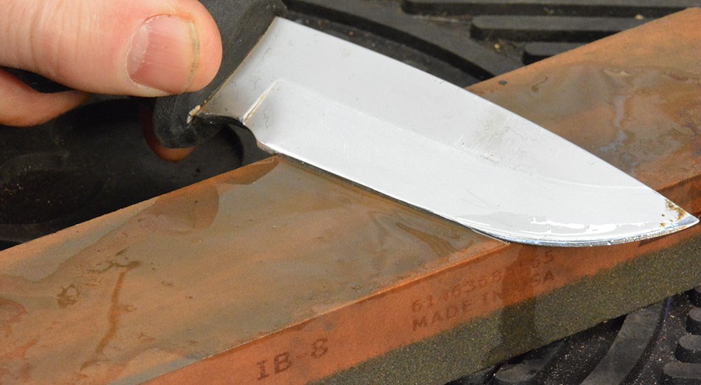 Sharpening Knife on Stone