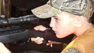 2012111615932-choosing_gun_kid_f.jpg