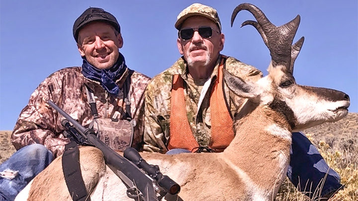 Hunters with antelope buck taken in Wyoming