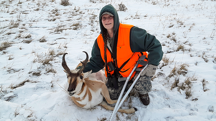 Disabled female hunter with bull antelope taken in Montana
