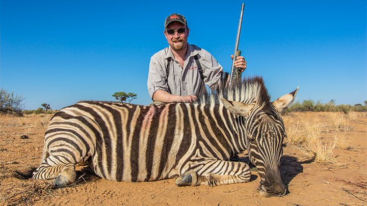 Hunter with Zebra in Namibia