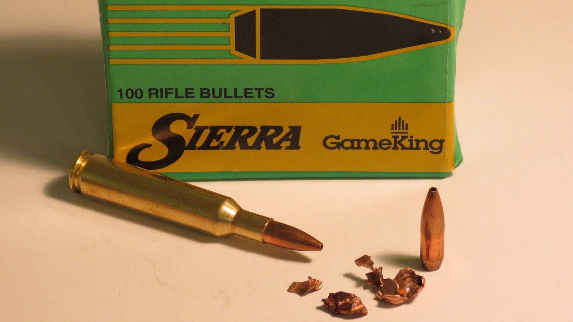 Box of Sierra GameKing, with cartridge, bullet and fragmentation pictured alongside