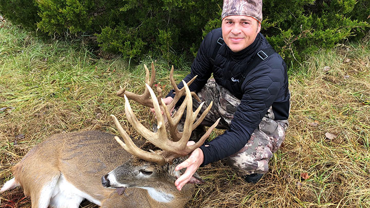 Hunter with Massive Whitetail Buck Scoring 238 6/8 inches taken in Missouri