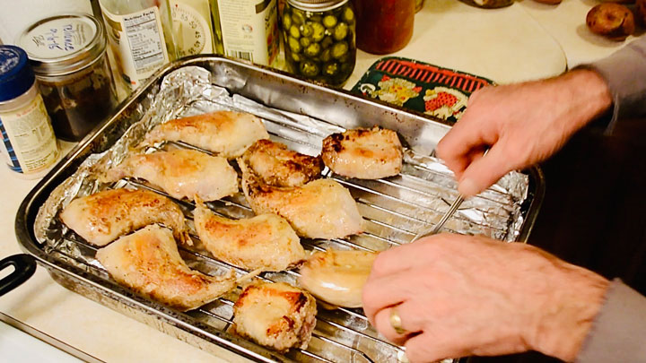 Greg's Baked Rabbit Supreme sizzling in a pan